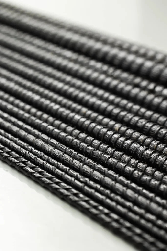 Materials manufactured by Arab Basalt Fiber Company, including basalt fiber products for construction and industrial use