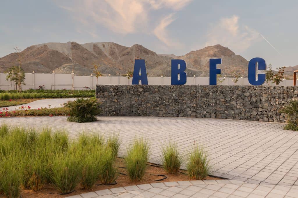 Arab Basalt Fiber Company logo on the exterior of the company building